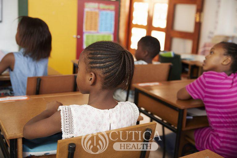 back-view-of-african-kids-in-an-elementary-school-P9BTWMZ-768x512